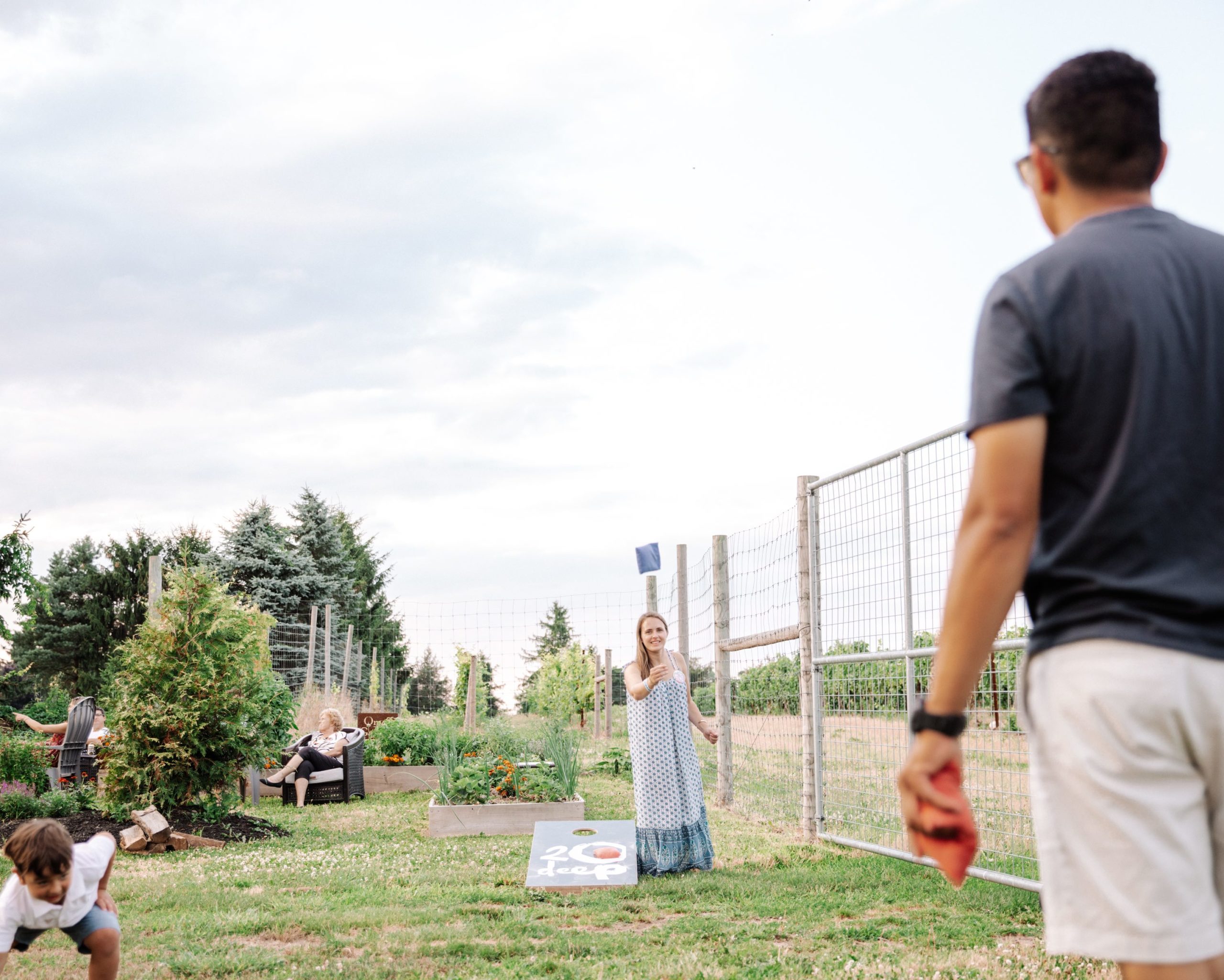 Playing corn hole and yard games at the winery